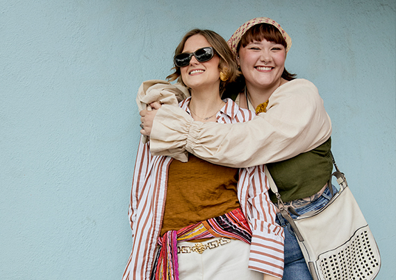 Close up shot of Daisy and Britt wearing summer fashion