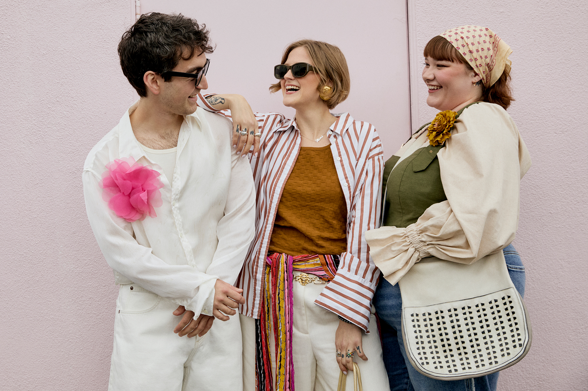 Charlie, Britt, and Daisy all wearing summer fashion and posed for the camera