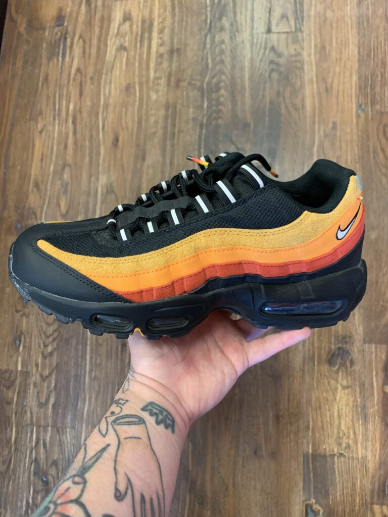 multi-colored sneakers that represent spring trends in men's fashion