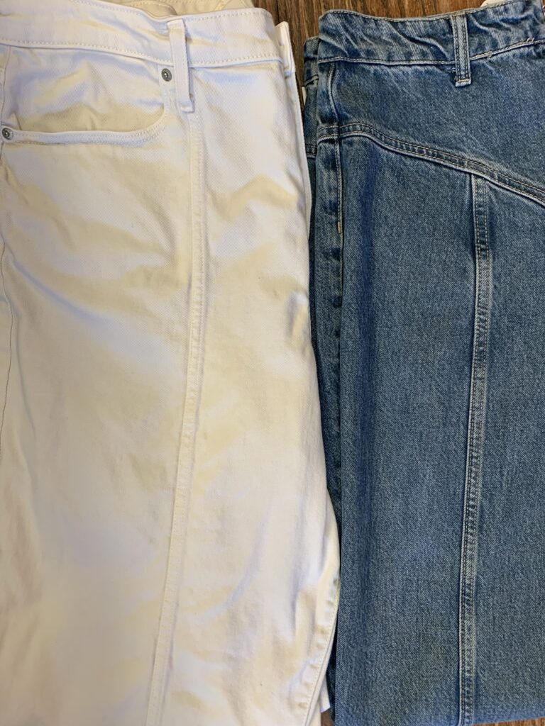 two pairs of jeans with twisted seams