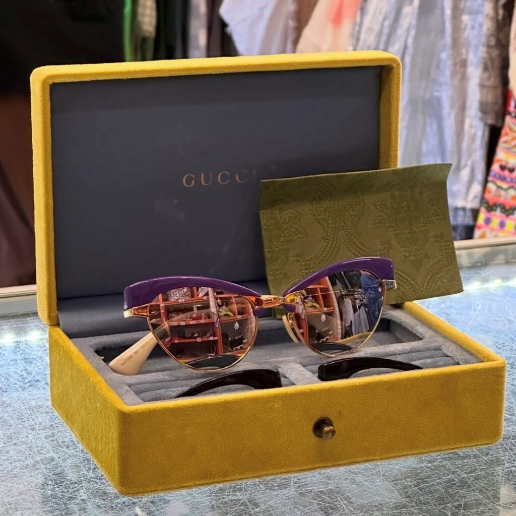 a preloved fashion example: a pair of Gucci sunglasses