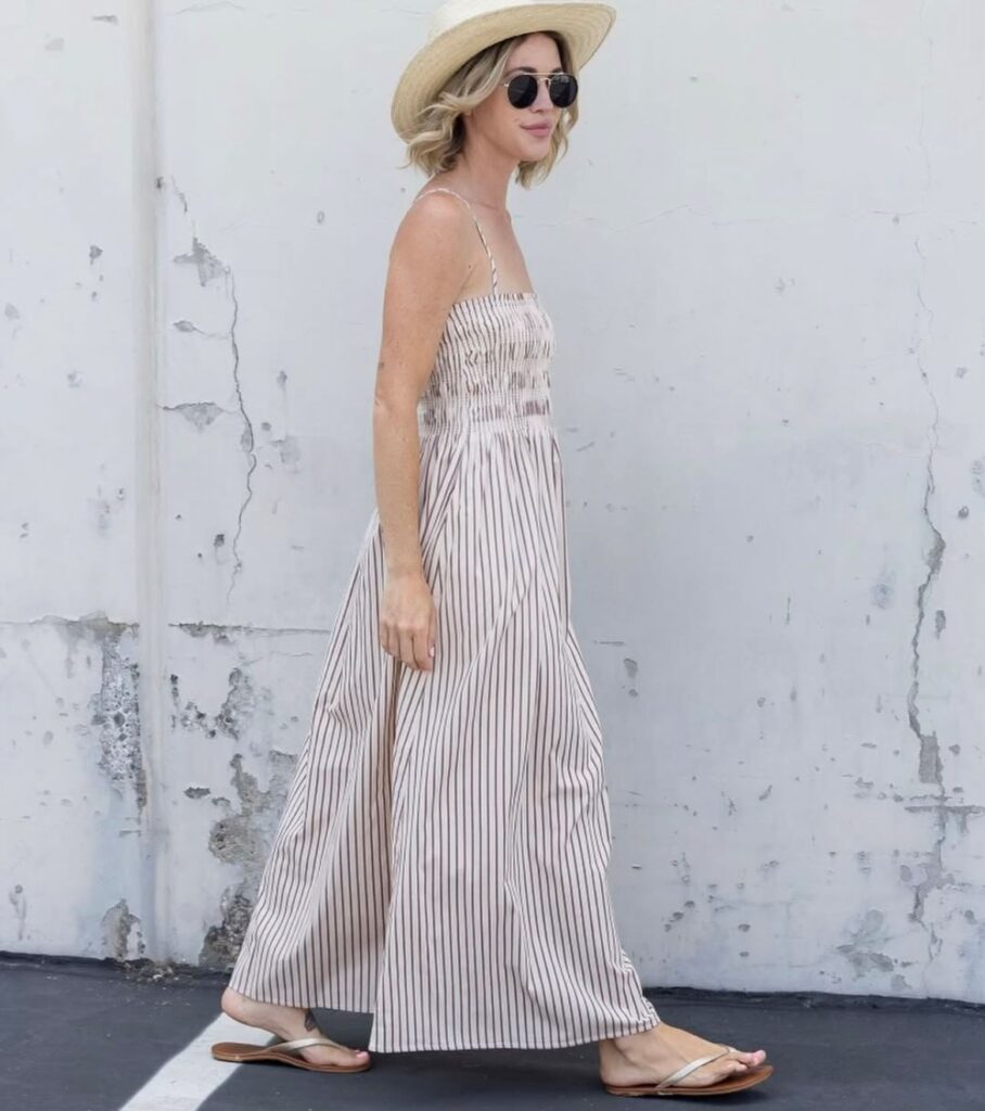 woman in long striped flowy dress