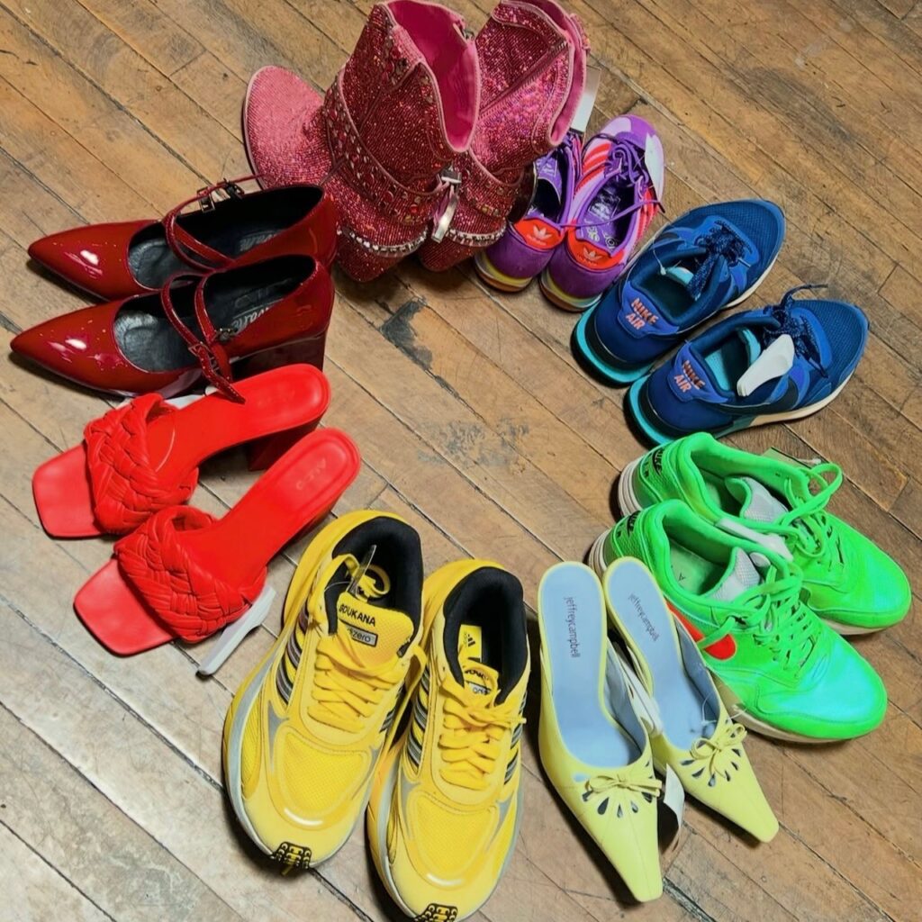 A circle of shoes making a rainbow of colors