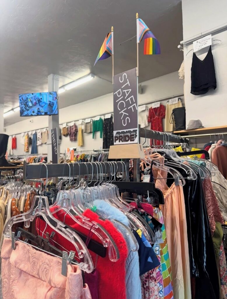 A rack of store finds inspired by Pride, on display in a Crossroads store