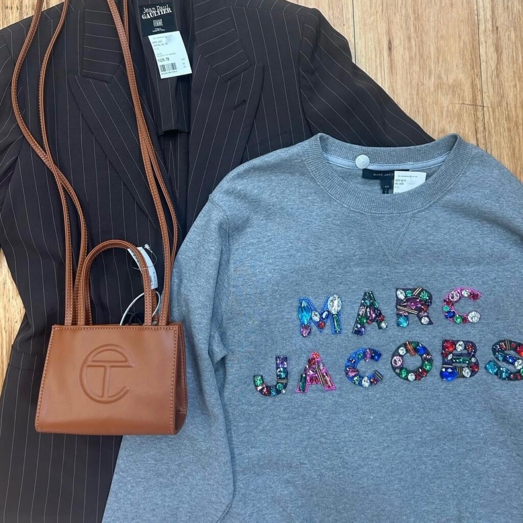 A Marc Jacobs sweatshirt and Telfar mini bag
