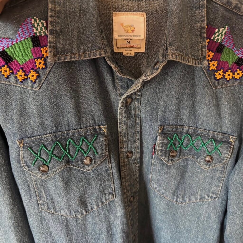 denim shirt with beaded shoulders and pockets