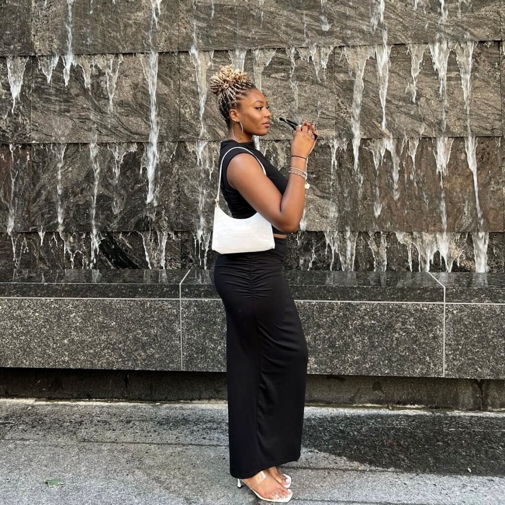 woman in sleeveless tank and long skirt