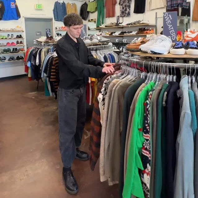 a man working in fashion retail