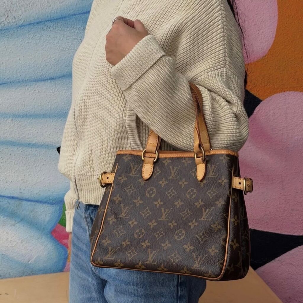 Woman holding a designer handbag