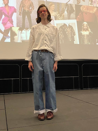 Nolan on stage giving a presentation