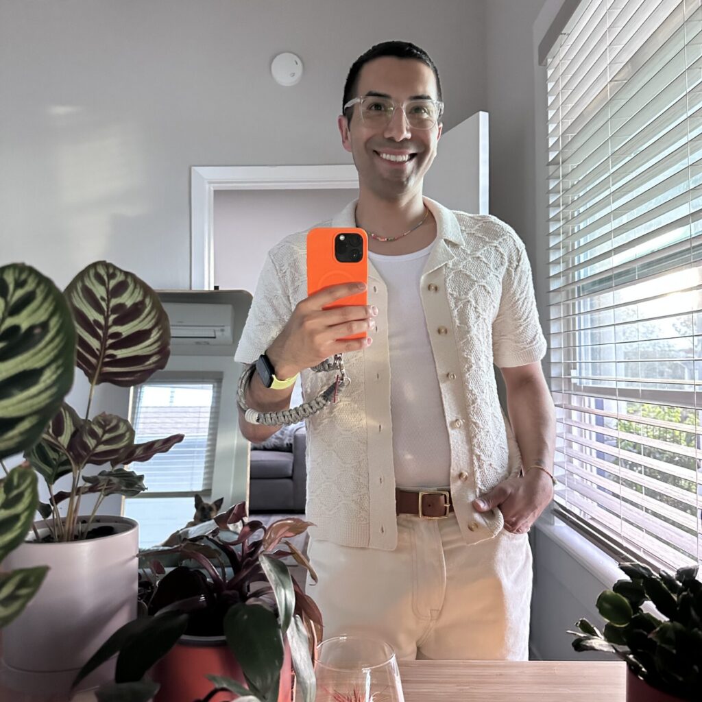 Jason in a cream-colored short-sleeve knit