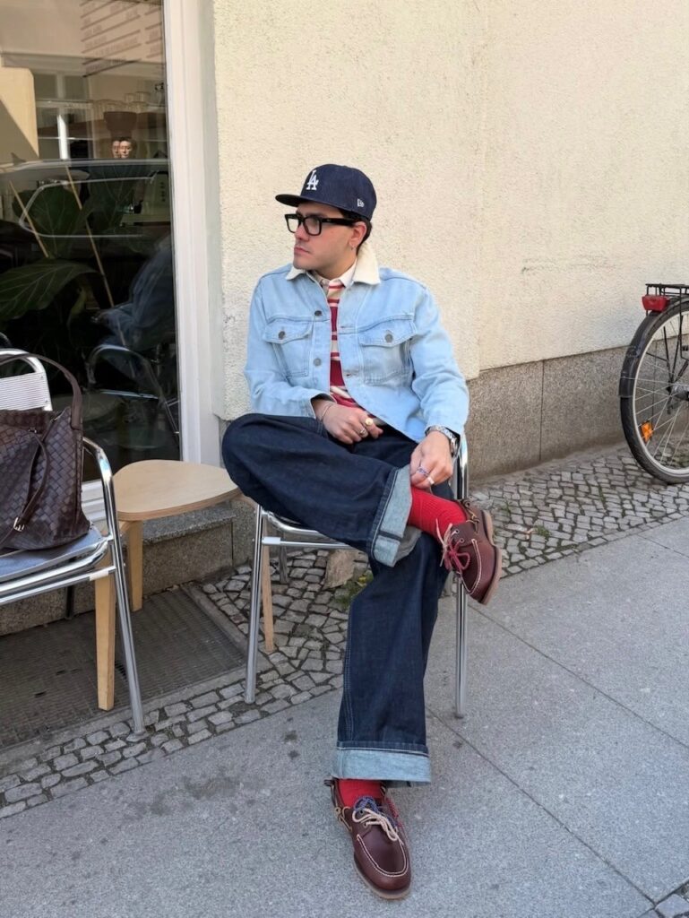 man in dark denim and rugby shirt with denim shirt