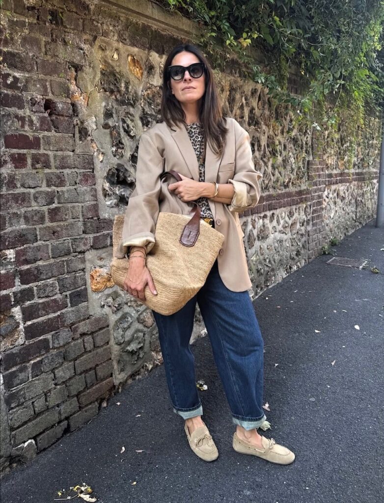 woman in straight leg jeans with blazer and boat shoes