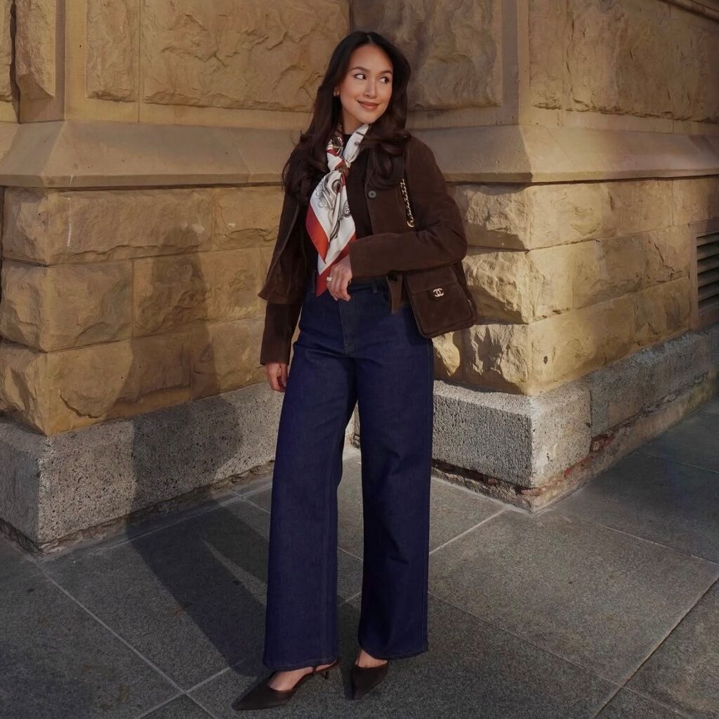 Woman in jeans with chocolate brown suede jacket