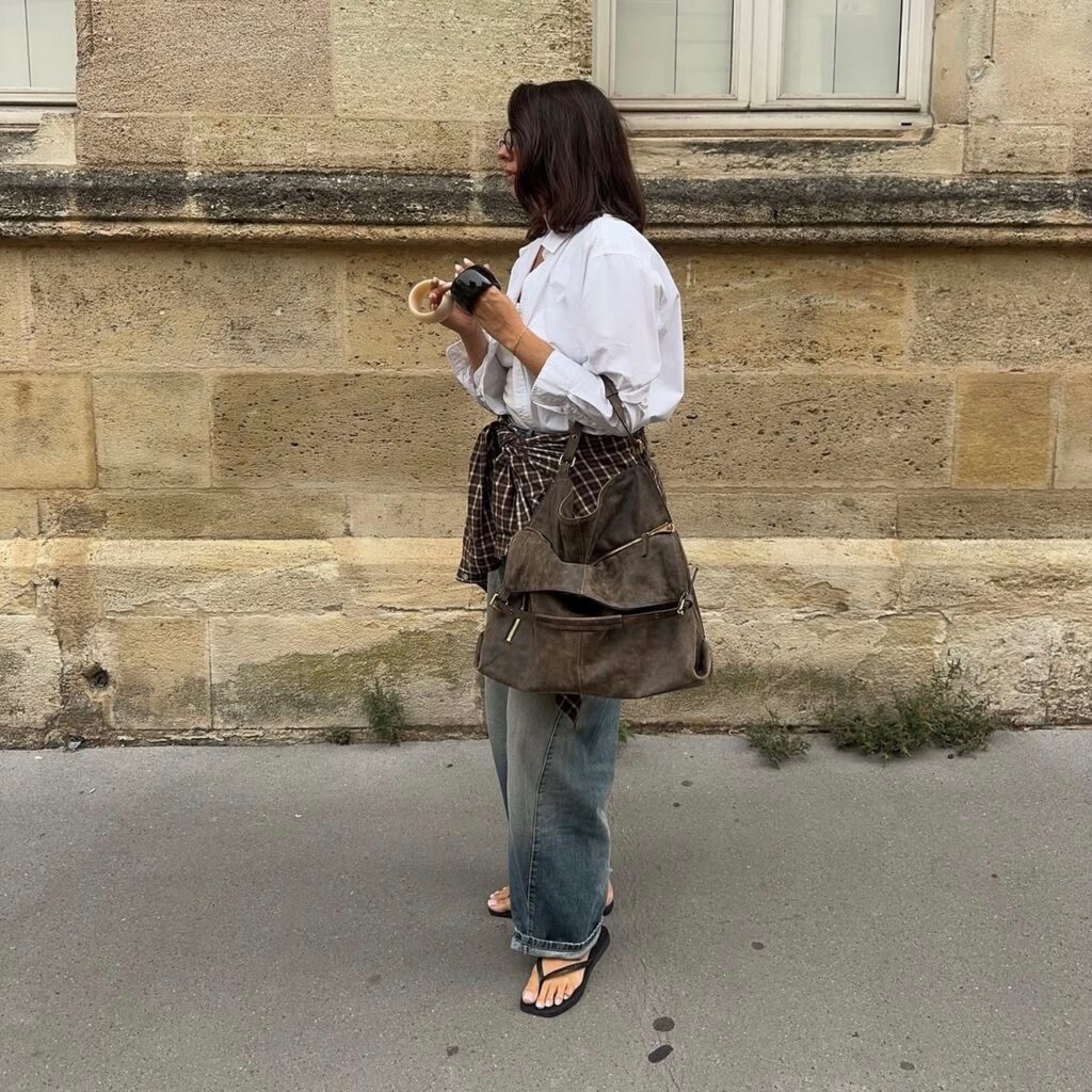 woman in boyfriend shirt and loose denim